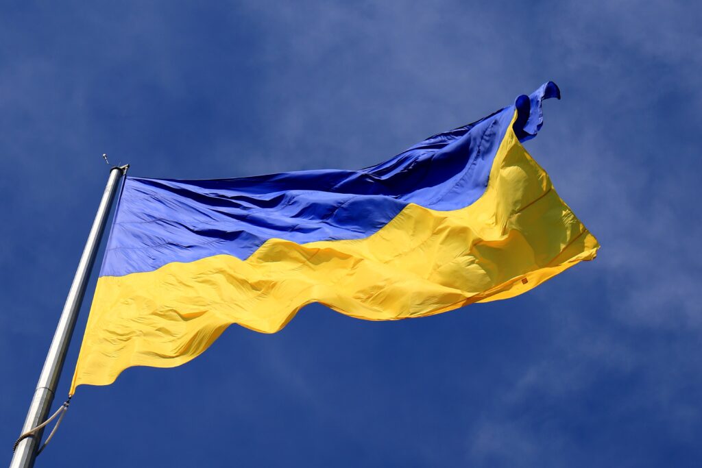 Ukraine,Flag,Large,National,Symbol,Fluttering,In,Blue,Sky.,Large